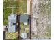 Aerial view of the property showcasing the lot layout with driveway, shed, and surrounding neighborhood at 2511 18Th N Ave, St Petersburg, FL 33713
