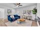 Bright living room with hardwood floors, a fireplace, and stylish furniture at 2511 18Th N Ave, St Petersburg, FL 33713