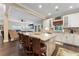 This gourmet kitchen features granite countertops, stainless appliances, and an island open to the living room at 2701 W Bay Ave, Tampa, FL 33611