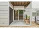 Cozy patio with sliding glass doors, perfect for outdoor relaxation and potted plants at 3107 W Horatio St # 11, Tampa, FL 33609