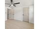 Spacious bedroom boasts wood-look floors and neutral paint at 3544 Edenwood Dr, Holiday, FL 34691