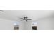 Well-lit bedroom with large windows and a modern ceiling fan at 3544 Edenwood Dr, Holiday, FL 34691