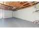 Spacious garage with open ceiling at 3544 Edenwood Dr, Holiday, FL 34691
