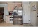 A kitchen with stainless steel appliances, light wood cabinets, and tile flooring at 3728 Parkway Blvd, Land O Lakes, FL 34639