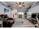 A living room featuring wood floors and shelving along the walls at 3728 Parkway Blvd, Land O Lakes, FL 34639