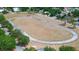 Aerial view of the community running track surrounded by trees at 3728 Parkway Blvd, Land O Lakes, FL 34639