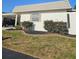 Well-manicured lawn and landscaping enhance this home's curb appeal at 4043 La Pasida Ln, New Port Richey, FL 34655
