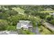 Aerial view showcasing the home, golf course, mature trees and green spaces at 4175 Northmeadow Cir # 4175, Tampa, FL 33618