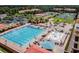 Aerial view of resort-style community featuring swimming pool, splash pad, and tennis courts at 4175 Northmeadow Cir # 4175, Tampa, FL 33618