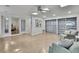 Bright bonus room features light hardwood flooring, ample natural light, and sitting area at 4175 Northmeadow Cir # 4175, Tampa, FL 33618