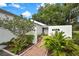 Inviting front exterior of the home with stylish address numbers and lush landscaping at 4175 Northmeadow Cir # 4175, Tampa, FL 33618
