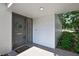 Charming front door with a wreath, stylish hardware, and a welcoming entrance mat at 4175 Northmeadow Cir # 4175, Tampa, FL 33618