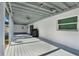 Covered patio with a ceiling fan and outdoor grill at 4310 S Coolidge Ave, Tampa, FL 33611