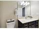 Bathroom with a modern vanity, light fixtures, toilet, and towel rack at 5150 Bay Isle Cir, Clearwater, FL 33760