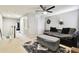 Bonus room with a ceiling fan, gray furniture, carpet, and neutral colored walls at 5150 Bay Isle Cir, Clearwater, FL 33760