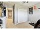 Bedroom view of closet doors in room with sports decor at 5150 Bay Isle Cir, Clearwater, FL 33760
