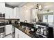 Modern kitchen featuring sleek countertops and stainless steel appliances, perfect for culinary enthusiasts and gatherings at 5150 Bay Isle Cir, Clearwater, FL 33760