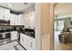 Inviting view into the spacious living area, flowing into a well-appointed kitchen, ideal for modern living at 5150 Bay Isle Cir, Clearwater, FL 33760