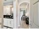 Inviting entryway with a view of the kitchen, and an open living area with great lighting at 5150 Bay Isle Cir, Clearwater, FL 33760