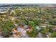 Charming single-Gathering home nestled among mature trees in a quiet neighborhood, located in a beautiful landscape at 5600 Bay Pines Lakes Blvd, St Petersburg, FL 33708