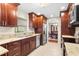 Well-equipped kitchen featuring stainless steel appliances and granite countertops at 5600 Bay Pines Lakes Blvd, St Petersburg, FL 33708