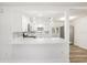 Remodeled kitchen with stainless appliances, marble counters, and pendant lighting at 5911 63Rd N Ter, Pinellas Park, FL 33781