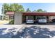 Carport attached to the building with parking spaces and covered area for vehicles at 601 N Hercules Ave # 101, Clearwater, FL 33765