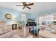 Comfortable living room with modern furniture, laminate floors, and plenty of natural light at 601 N Hercules Ave # 101, Clearwater, FL 33765