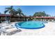 This beautiful pool has ample lounge chairs and a sparkling blue swimming area at 601 N Hercules Ave # 101, Clearwater, FL 33765