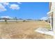 Sprawling backyard offering privacy, with ample space for recreation and landscaping opportunities at 6967 Silverado Ranch Blvd, Zephyrhills, FL 33541