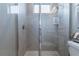 Bathroom featuring a tiled glass shower with tiled accents, and a modern rain shower head at 712 Estates Blvd, Tarpon Springs, FL 34689