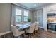 Charming dining room with stylish decor and seamless flow to the gourmet kitchen at 712 Estates Blvd, Tarpon Springs, FL 34689