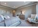 Relaxing main bedroom with a tray ceiling, comfortable furnishings, and soft, neutral tones at 712 Estates Blvd, Tarpon Springs, FL 34689