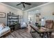 Inviting home office space with stylish decor, a desk, and easy access to other living areas at 712 Estates Blvd, Tarpon Springs, FL 34689