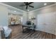 Bright office space with tray ceiling, modern lighting, and an adjacent dining room at 712 Estates Blvd, Tarpon Springs, FL 34689