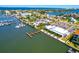 Beautiful aerial view of a waterfront restaurant with ample parking, boat docks and open-air waterfront dining at 732 Kingston Ct, Apollo Beach, FL 33572
