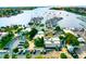 Aerial view of a marina with docks, boats, parking, landscaping and a beautiful waterfront setting at 732 Kingston Ct, Apollo Beach, FL 33572