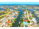 Wonderful aerial view showcases waterfront homes with docks along winding canals in a beautiful neighborhood at 732 Kingston Ct, Apollo Beach, FL 33572