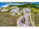 Expansive view of Apollo Beach Preserve featuring recreational facilities, parking, and waterfront views at 732 Kingston Ct, Apollo Beach, FL 33572