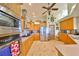 Spacious kitchen with modern appliances, stainless refrigerator and custom cabinets at 732 Kingston Ct, Apollo Beach, FL 33572
