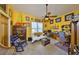 This office is brightly lit with natural light and has room for a small lounge area at 732 Kingston Ct, Apollo Beach, FL 33572