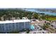 Condominium aerial view shows a building with a pool and a view of the bay at 7321 Central Ave # 503, St Petersburg, FL 33710