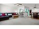 Cozy living room is adjacent to the kitchen at 7321 Central Ave # 503, St Petersburg, FL 33710