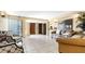 Elegant lobby area with comfortable seating, tiled floors, and access to elevators at 7321 Central Ave # 503, St Petersburg, FL 33710