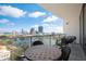 Relaxing balcony with seating and a view of the city skyline over the lake at 777 3Rd Ave N # 1403, St Petersburg, FL 33701