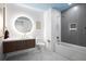 Modern bathroom featuring a vanity with vessel sink and a tiled shower and tub at 777 3Rd Ave N # 1403, St Petersburg, FL 33701
