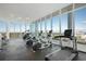 Modern fitness center with floor-to-ceiling windows and state-of-the-art exercise equipment at 777 3Rd Ave N # 1403, St Petersburg, FL 33701