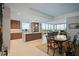 Spacious living area with modern kitchen, dining area, and stunning city views at 777 3Rd Ave N # 1403, St Petersburg, FL 33701