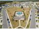 Community boasts a pool, playground, and clubhouse amidst green spaces, creating a desirable living experience at 7797 Peace Lily Ave, Wesley Chapel, FL 33545