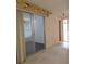 Bright indoor living space featuring a large sliding glass door for natural light at 7812 Heather St, New Port Richey, FL 34653